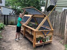 Pin on gardening in 2024 | Backyard greenhouse, Veggie garden design ...