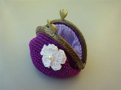 Crochet coin purse lined with fabric and little flower