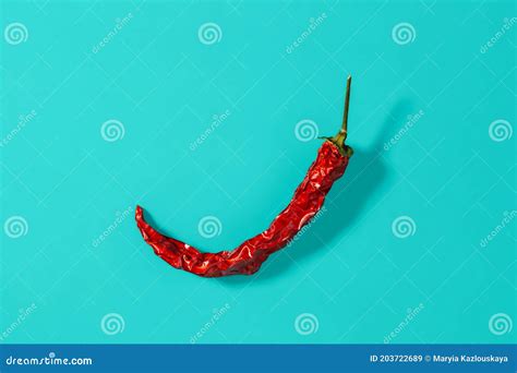 Red Hot Pepper Dry Pod Casts Shadow on a Marine Blue Background. Natural Spices and Seasonings ...