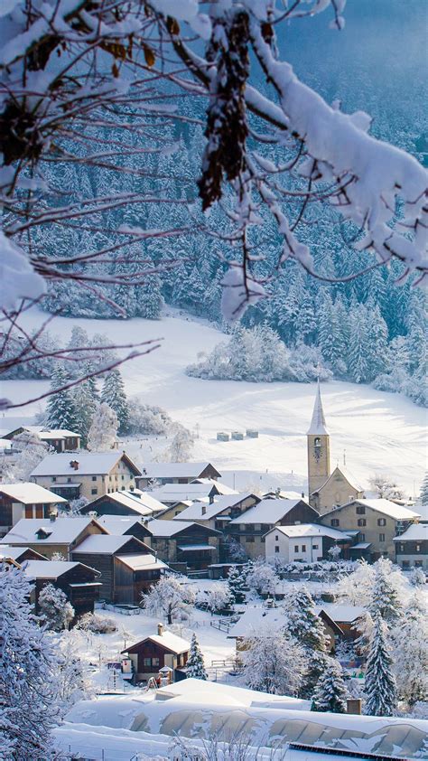 The small town of Filisur with snow in winter, Switzerland | Windows ...