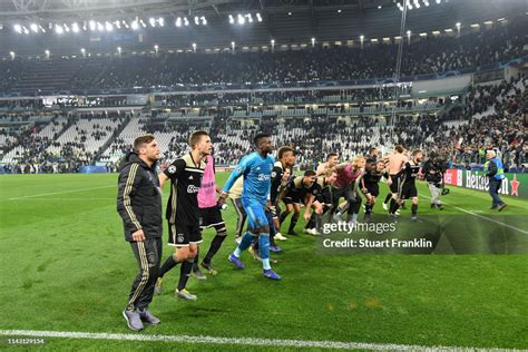 The Ajax team celebrate winning the UEFA Champions League Quarter ...