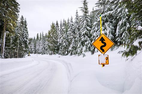 Snow-Covered Mountain Road with Stock Photo - PixelTote