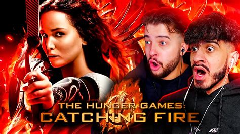 FIRST TIME WATCHING *THE HUNGER GAMES: CATCHING FIRE* - YouTube