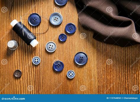 Thread, Fabric and Buttons for Tailoring Stock Photo - Image of fashion ...