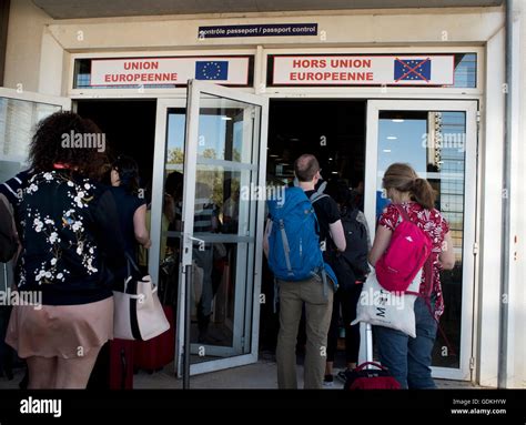 Waiting to go through French passport control, with one door for European Union and one for non ...