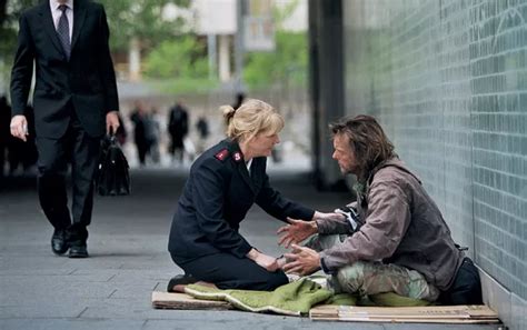 Person Helping Homeless