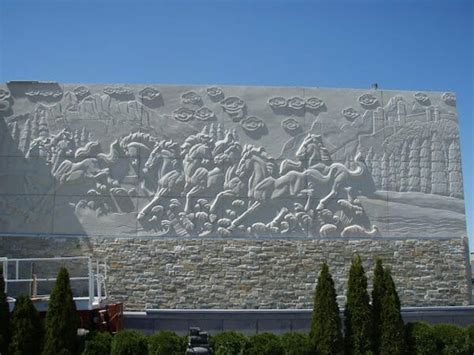 Wall Relief Sculpture Installation - Carved Stone Creations