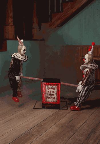 two creepy clowns are playing with a sign