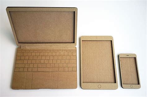 A cardboard laptop, tablet and mobile, which were used to prototype interfaces in the workshop ...