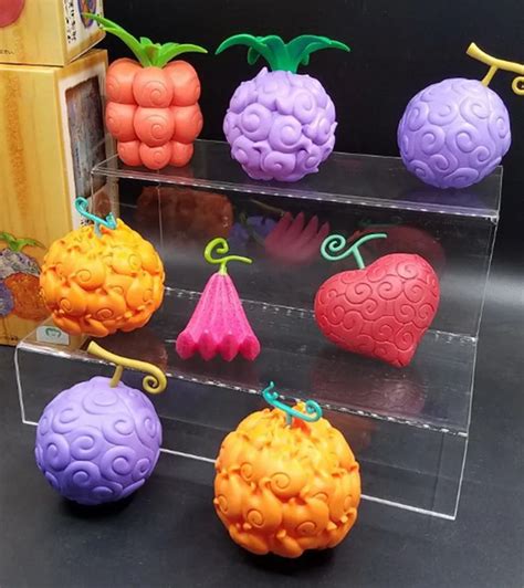 One Piece Devil Fruits 4pcs/set Mini Action Figures Gum Gum Fruit Mera mera Fruit PVC figure ...