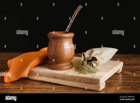 yerba mate tea traditional in Argentina on a black background Stock ...