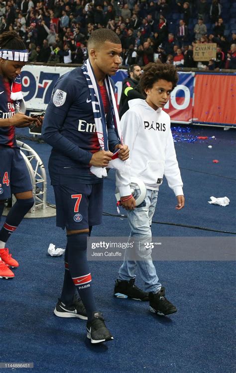 Kylian Mbappe of PSG and his little brother Ethan Mbappe celebrate ...