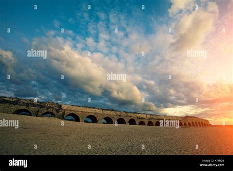 Old Aqueduct on the beach in Caesarea, Israel Stock Photo - Alamy