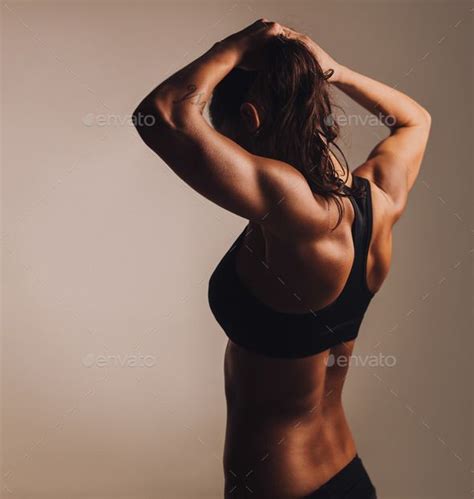 Fitness female showing muscular back | Workout pictures, Fitness models female, Muscular women