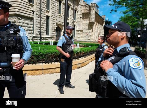 Chicago police officers, wearing bullet proof vest, on patrol in Downtown Chicago Stock Photo ...