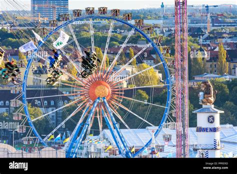 München, Munich: Oktoberfest beer festival: view, beer tent, rides ...