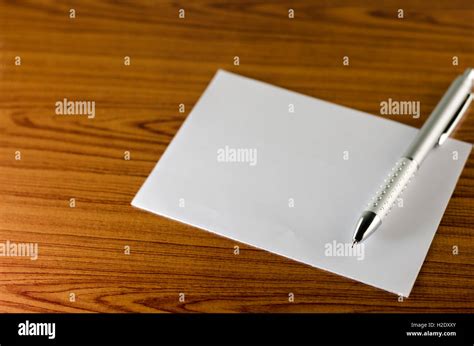 pen with white paper Stock Photo - Alamy