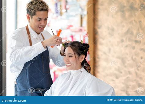 Beautiful Asian Woman Sit and Smile in Beauty Salon Shop that Take Care of Hair Cut by Barber ...