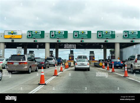 Florida Turnpike highway toll booths with SunPass lanes during the ...