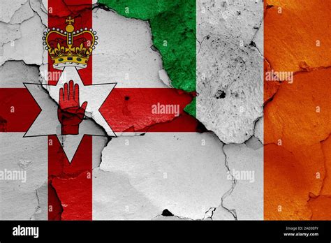 flags of Northern Ireland and Ireland painted on cracked wall Stock ...