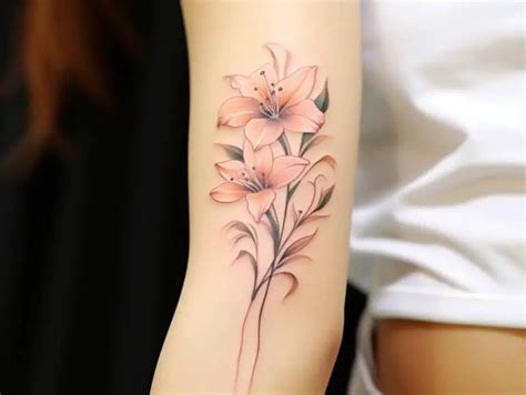 The Significance of Lily Tattoo Meanings + Designs