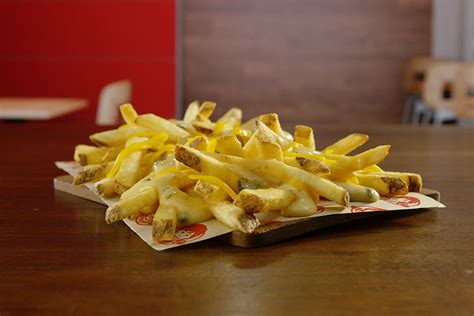 Wendy’s Launches Loaded Nacho Cheeseburger and Queso Fries Plus a $3 ...