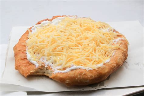 langos sour cream cheese in budapest - Hungary Photo Tours