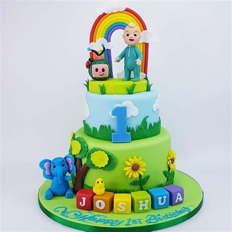 Cocomelon garden rainbow cake