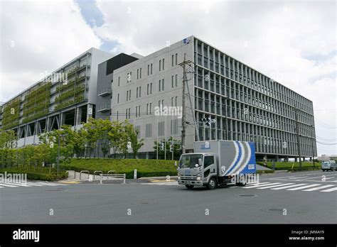 A Sagawa Express delivery truck drives past the Sagawa headquarters on July 28, 2017, Tokyo ...