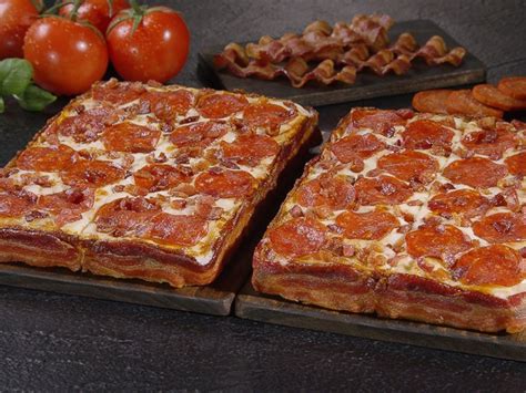 Little Caesars Announces New Bacon-Wrapped Pizza to Mixed Reactions ...