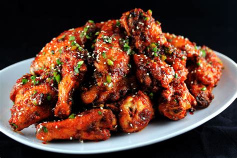 Sweet and Spicy Garlic Ginger Chicken Wings | CarnalDish