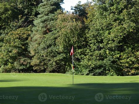 Golf course flag 5764115 Stock Photo at Vecteezy