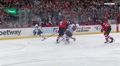 Connor Bedard Exits Blackhawks-Devils Game After Taking Big Hit From Brendan Smith