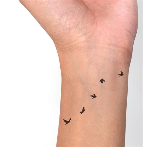 Realistic Flying Bird Tattoo