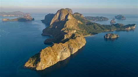 Sunrise at Bacuit Bay, Palawan, Philippines [OC] [5281 X 2971] : r/EarthPorn