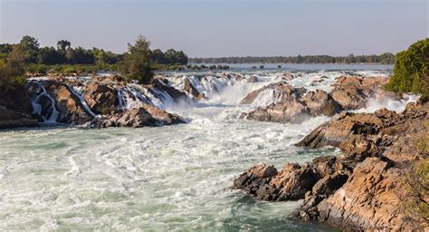 In which country are the largest waterfalls in Southeast Asia?