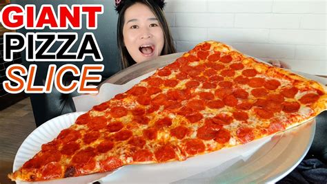 Eating The World's Largest Pizza Slice In New York City! Pizza Barn ...