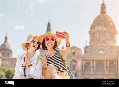 Two young happy women tourists friends travel in Barcelona, Spain Stock ...