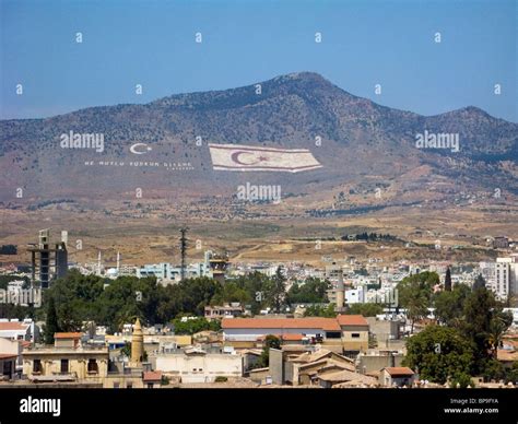 Turkish flag and the flag of the Turkish Republic of Northern Cyprus painted on the Kyrenia ...