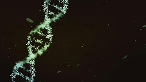 Premium Photo | A dna strand is shown in green on a black background