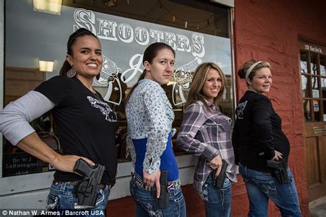 Colorado Shooters Grill arms waitresses with loaded guns | Daily Mail Online