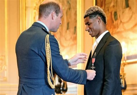 Marcus Rashford receives MBE from Prince William at Windsor Castle