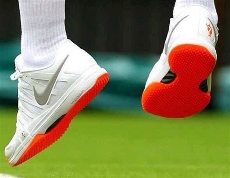 Roger Federer told to change orange shoes at Wimbledon | Larry Brown Sports