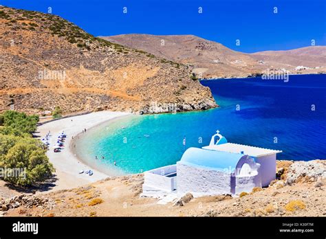 Beautiful beach of Astipalea island,view with azure sea and little church,Greece Stock Photo - Alamy