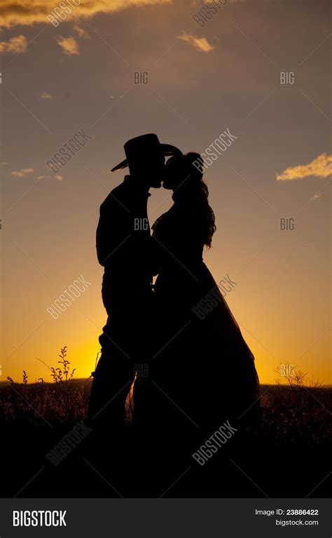 Cowboy Couple Silhouette Kiss Stock Photo & Stock Images | Bigstock