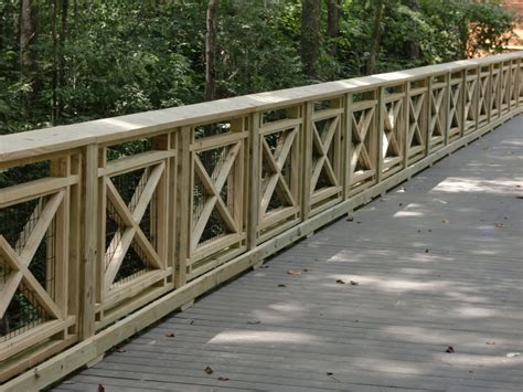 Timber Pedestrian Bridge with railing and curbing. | Modern fence design, Handrail design, Fence ...