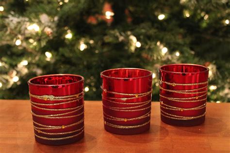 Shinny Red Votive Holders with glittered gold swirls. Great Gift! Exclusivelychristmas.com ...