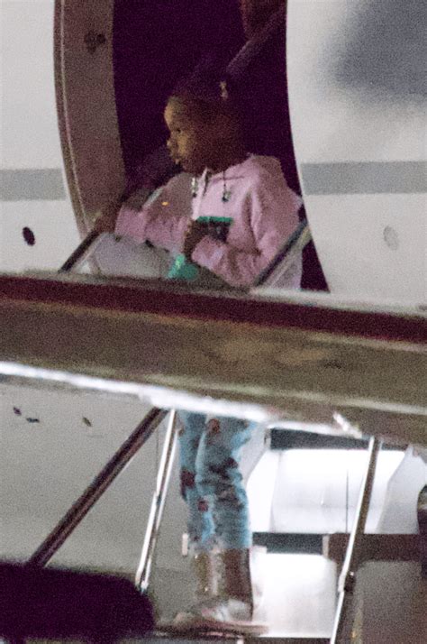 Beyonce’s Daughter Rumi Carter Sparkles in Gold Ugg Boots After Dubai – Footwear News