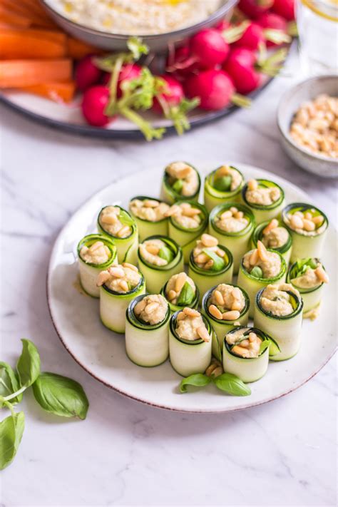 Finger Food Zucchini Basil Rolls with basil hummus - Heavenlynn Healthy