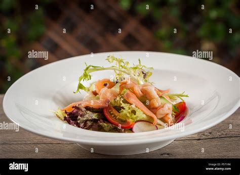 Salmon and shrimp salad Stock Photo - Alamy